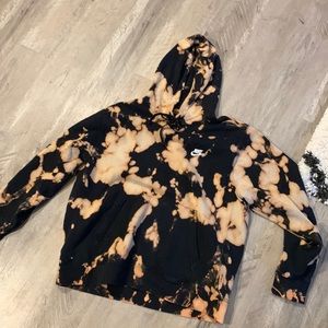 One of a kind Nike hoodie with custom bleach pattern.